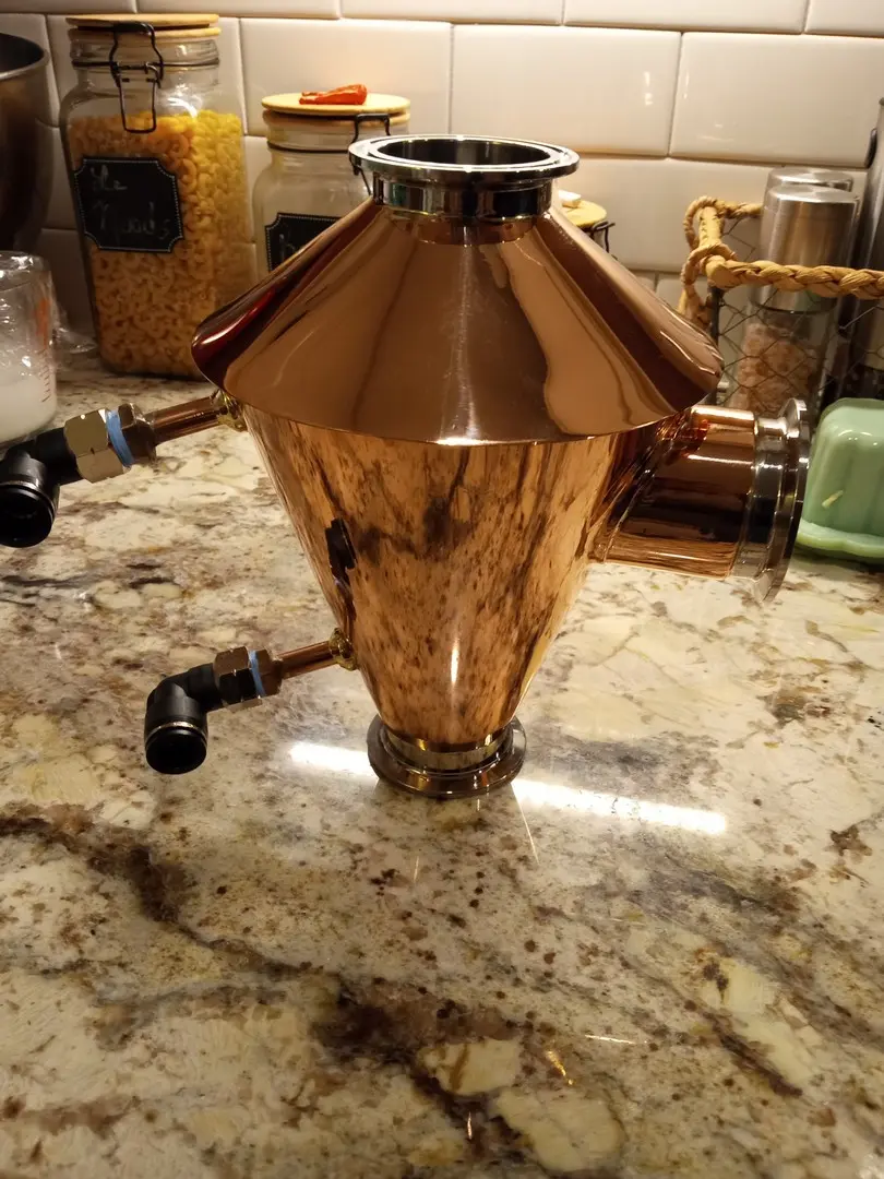 Handcrafted copper Mr. Fusion still head, showing its polished diamond-shaped body